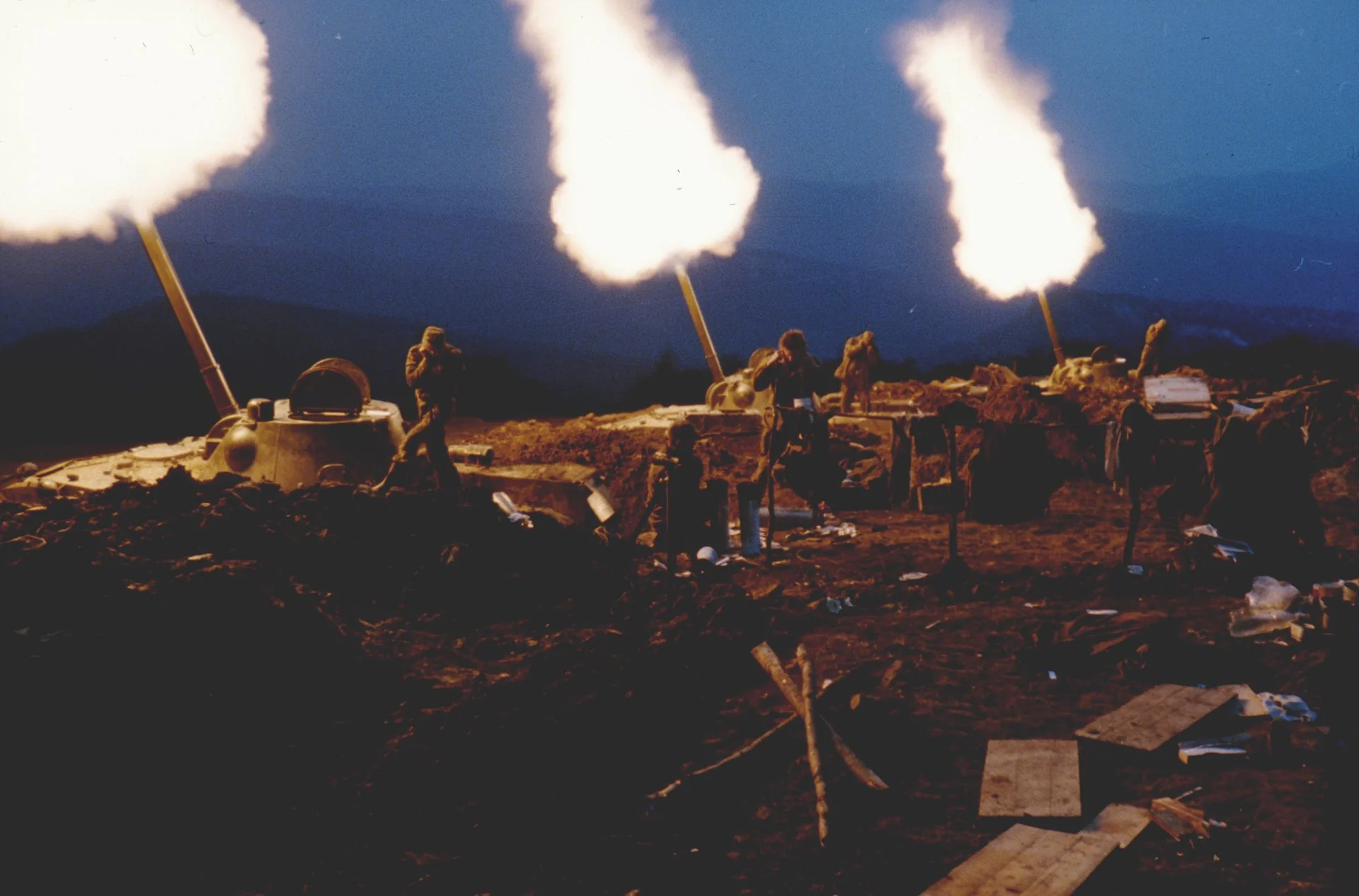 Russian artillery fires on Chechen rebels in the mountains near the village of Engenoy during the Second Chechen War.